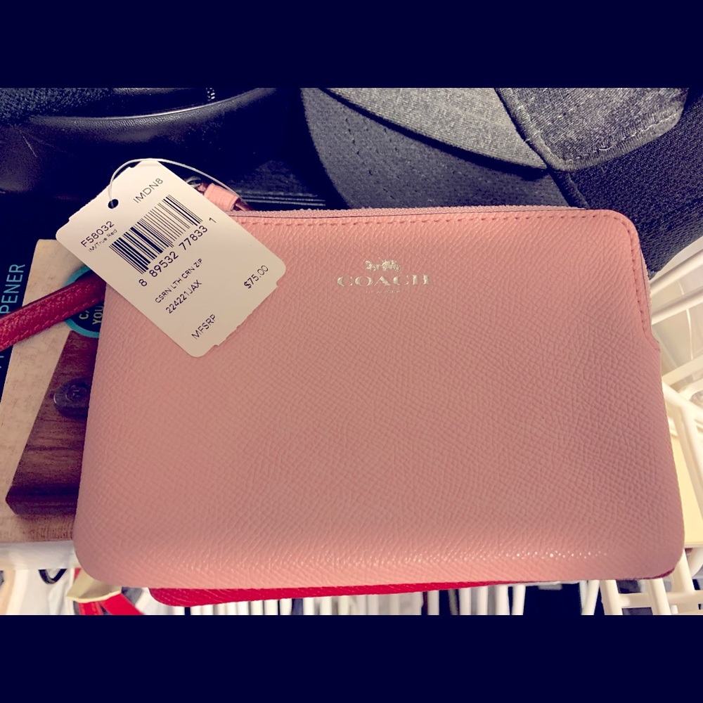 Coach wristlet in pastel pink